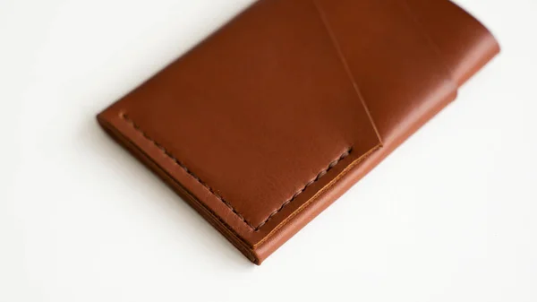 Empty mens business handmade leather card holder with isolated on white background. Selective focus, copy space, close up. — Stock Photo, Image