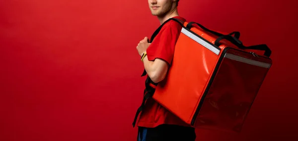 Portrait Young Courier Delivery Man Uniform Thermo Backpack Isolated Red — Zdjęcie stockowe