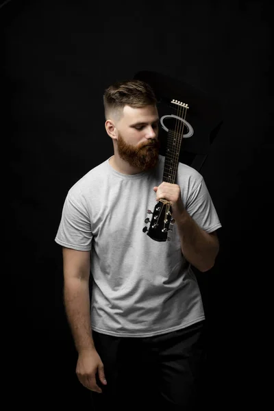 Brutal Handsome Bearded Man Grey Shirt Guitar Shoulder Portrait Male — стоковое фото