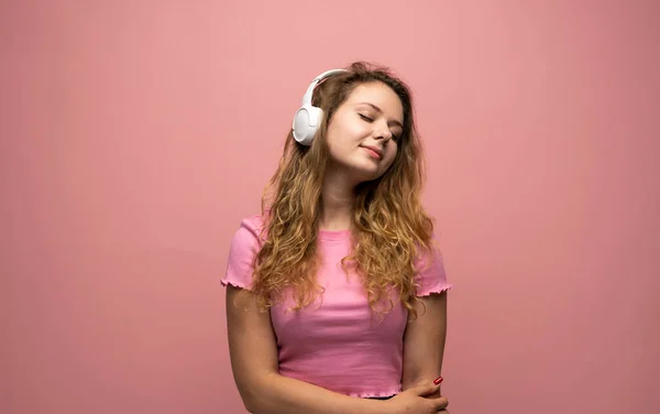 Portrait Charming Curly Woman White Massive Headphones Listening Music Isolated —  Fotos de Stock