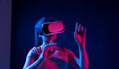 Interior Designer Using a VR Software and VR headset to Design a project of new home