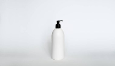 Liquid container for gel, lotion, cream, shampoo, bath foam. Cosmetic plastic bottle with black dispenser pump