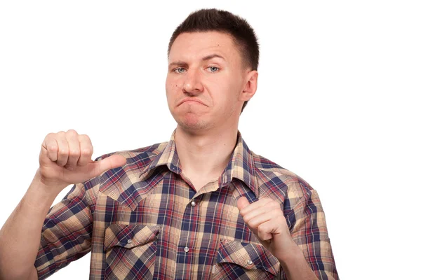 Man in a plaid shirt showing thumbs up to himself — Stock Photo, Image