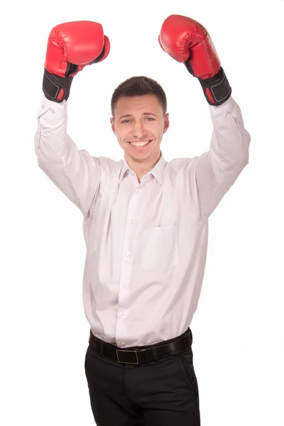 Geschäftsmann hob triumphierend die Arme in Boxhandschuhen — Stockfoto