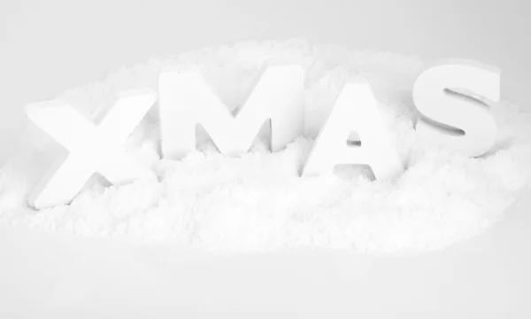 Vánoce, bílá dřevěná písmena ve sněhu — Stock fotografie