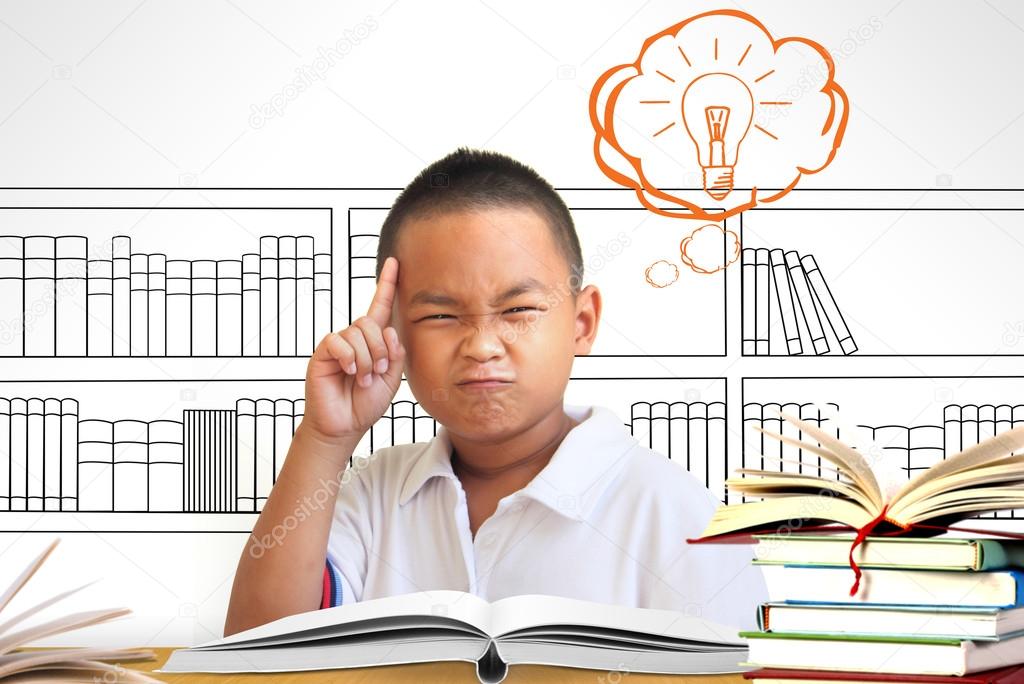The Asian boy thinking in classroom
