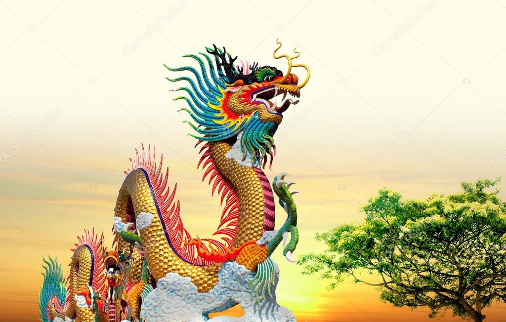 Chinese dragon at sunset in the background