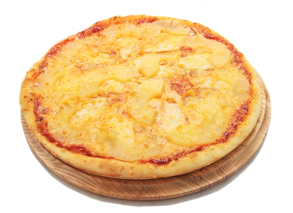 Hawaiian pizza on a wooden platter — Stock Photo, Image