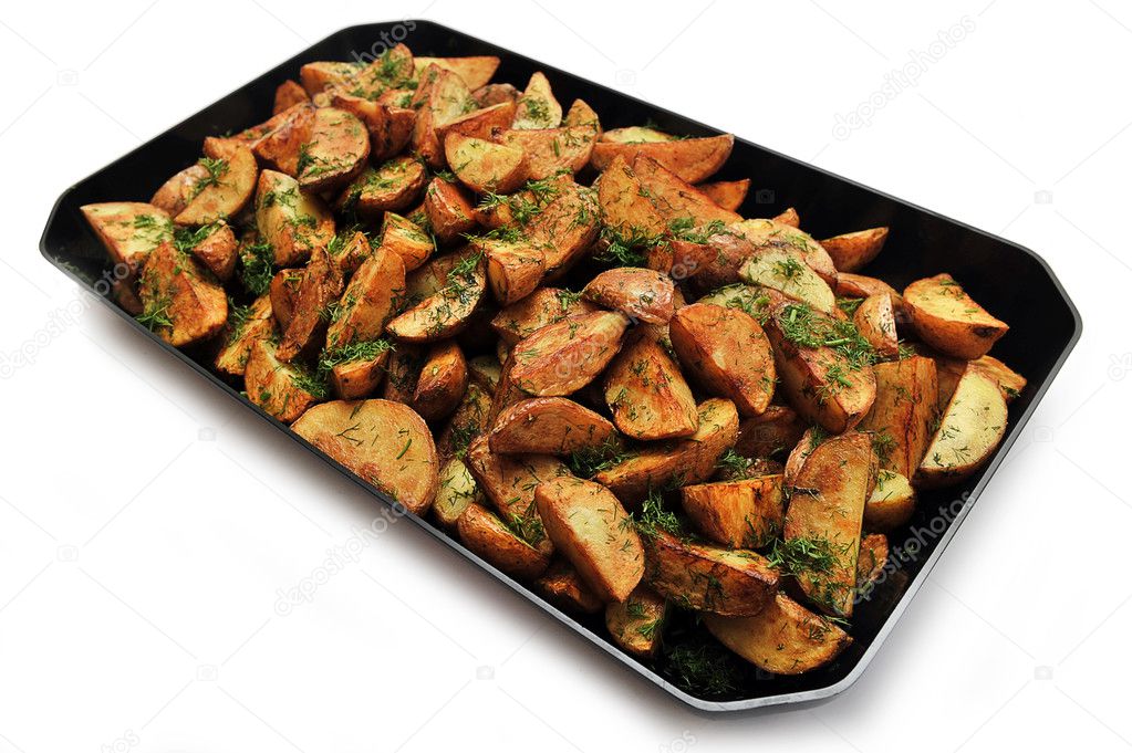 Potatoes fried in a frying pan with dill