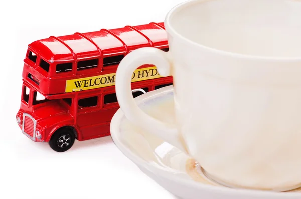 Bus and cup — Stock Photo, Image