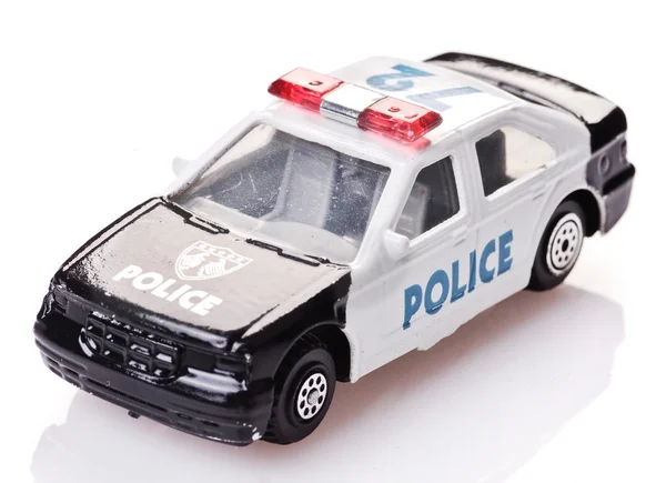 Coche de policía de juguete con insignia — Foto de Stock