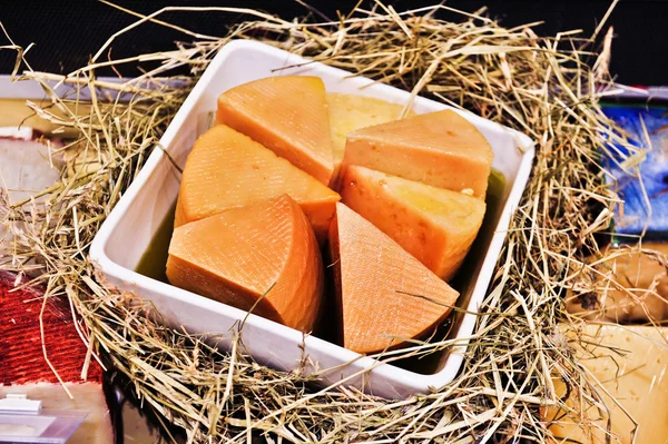 Hard cheese on store shelves — Stock Photo, Image