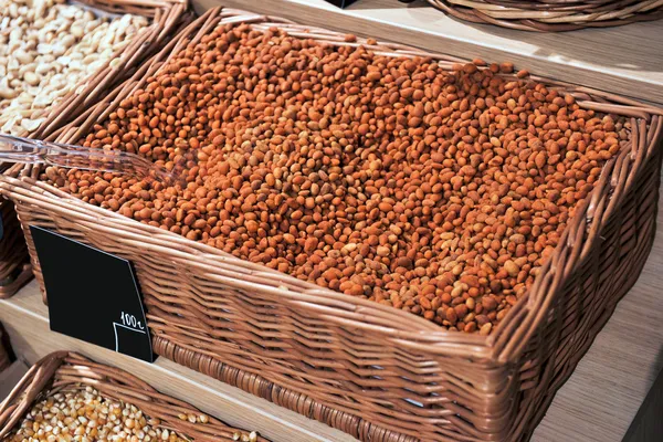 Various dried nuts in market — Stock Photo, Image