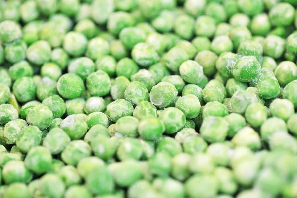 Frozen green peas background — Stock Photo, Image