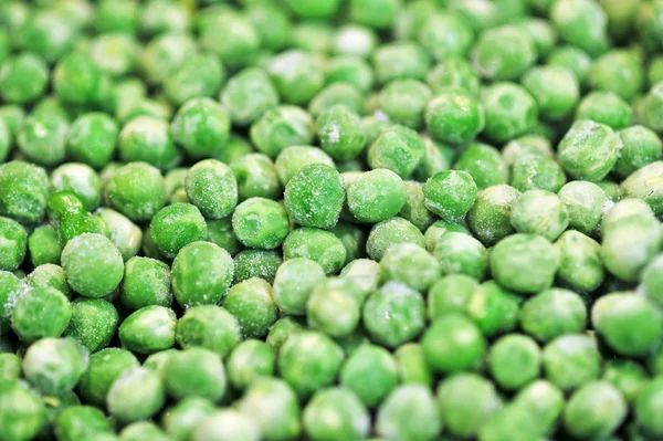 Frozen green peas background — Stock Photo, Image