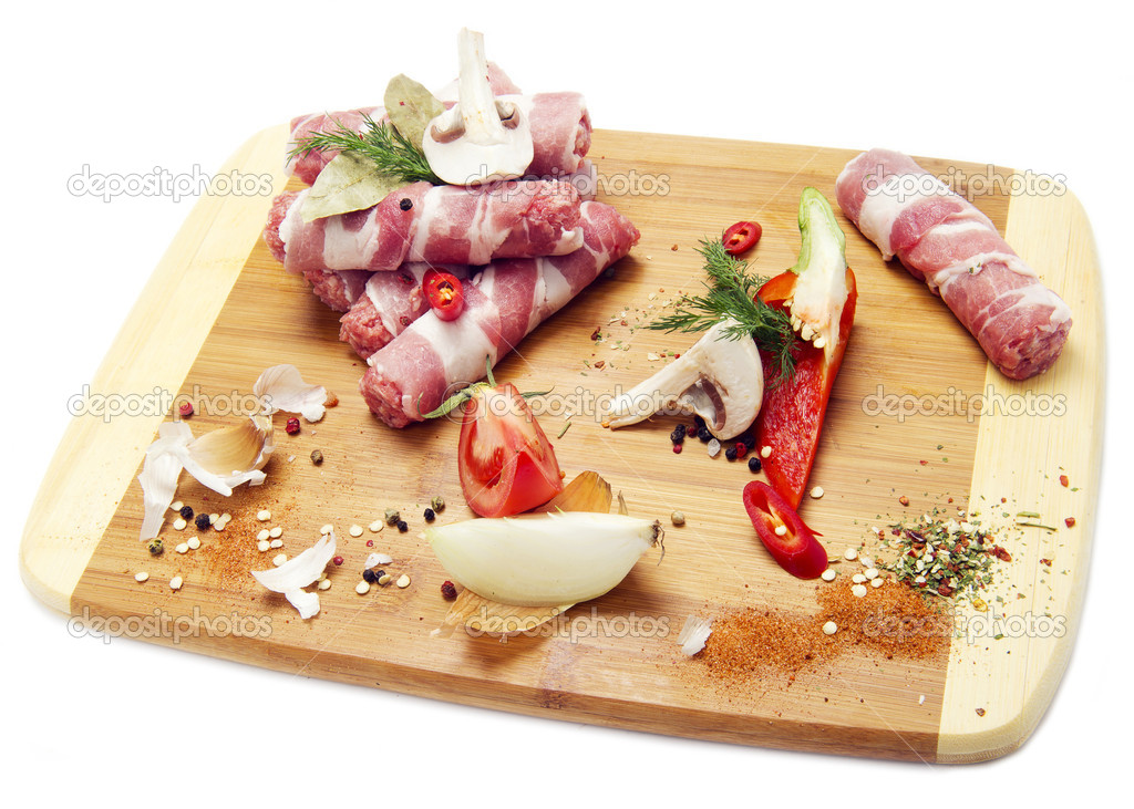 pieces of raw meat on the board