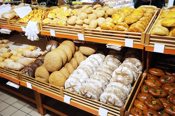 Lots of fresh crisp loaves of bread — Stock Photo, Image