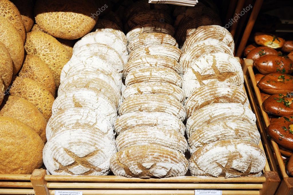 shelves with bread in shop