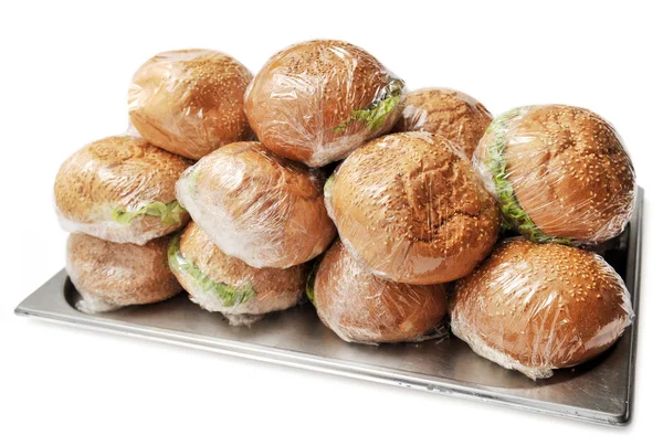 Tray with the burgers on a white background — Stock Photo, Image