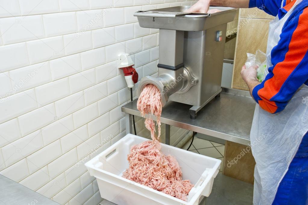 Mincer and a pile of chopped meat