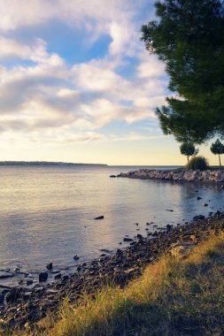 Peaceful coast in the evening in Adriatic sea, Portoroz - Portorose, Slovenia. Travel, tourism and environment concepts