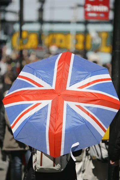 Union Jack Umbrella in a crowd — Stock Photo, Image
