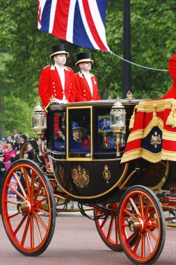 Queen Elizabeth II on the Royal Coach clipart