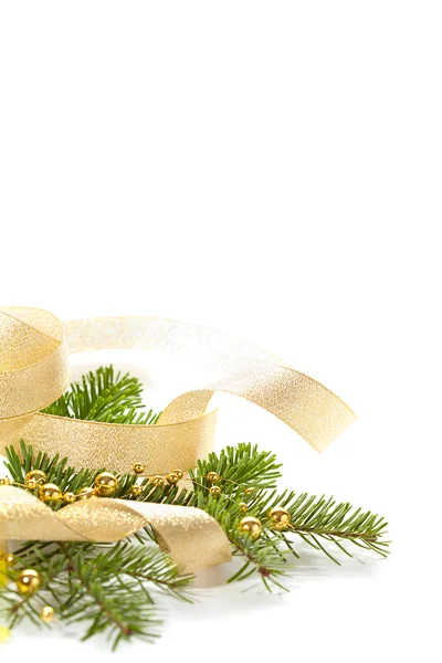 Christmas seasonal background with spruce and golden beads isola — Stock Photo, Image