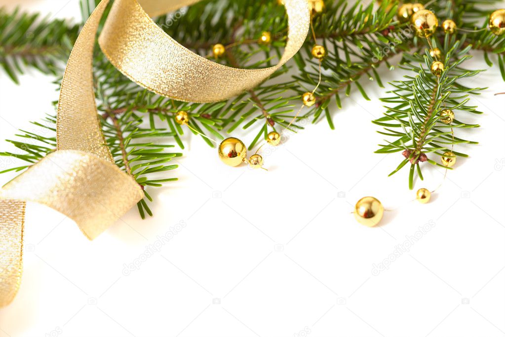 Cristmas seasonal background with spruce and golden beads isolat