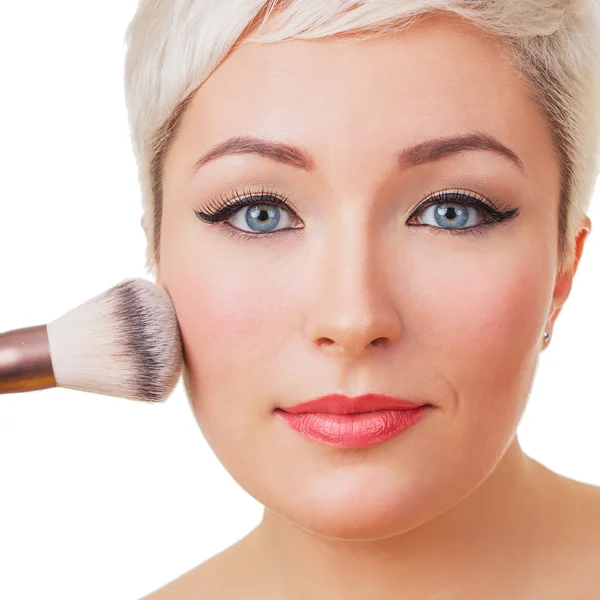 Face portrait of beautiful young woman with makeup brush isolate — Stock Photo, Image