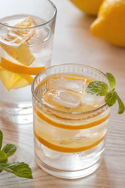 Fresh cold lemonade with lemons — Stock Photo, Image