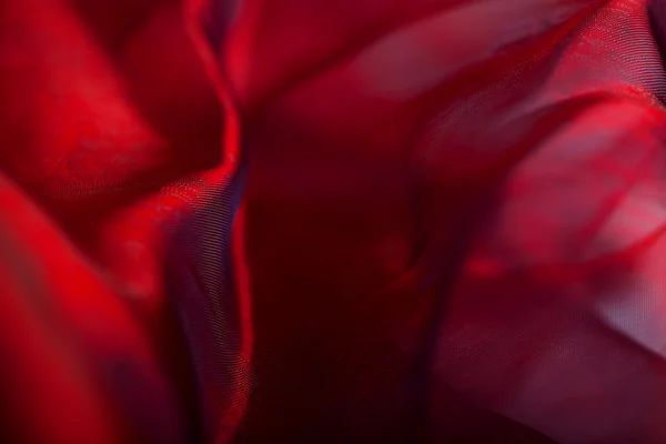 抽象的暗红色织物背景 — 图库照片