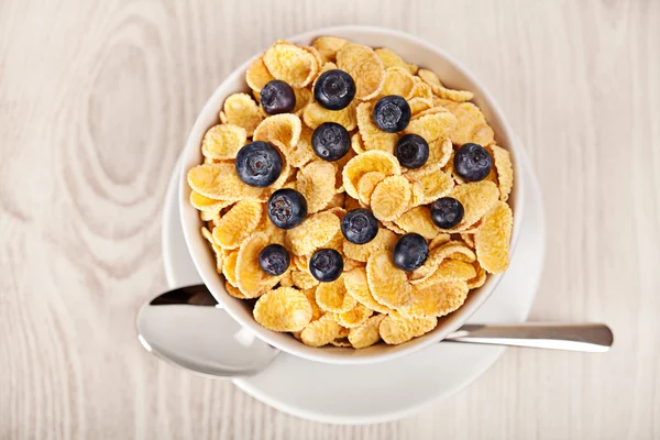 Corn flakes with blueberries breakfast