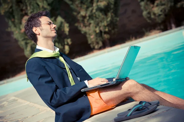 Funny Young Businessman next to the Pool — Stock Photo, Image