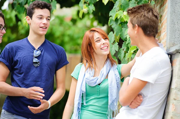Portrait of happy teens in the park at summer Stock Image