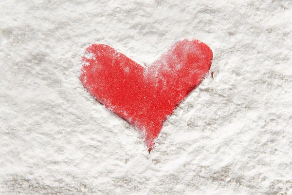 Shape of a red heart in flour — Stock Photo, Image