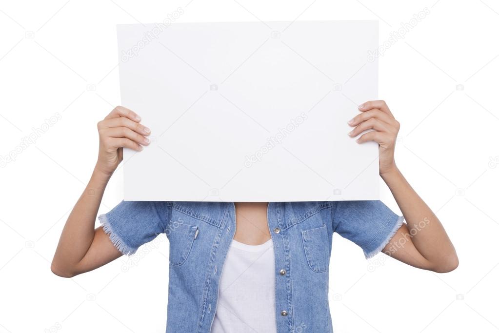 Girl holding a blank signboard front of her face
