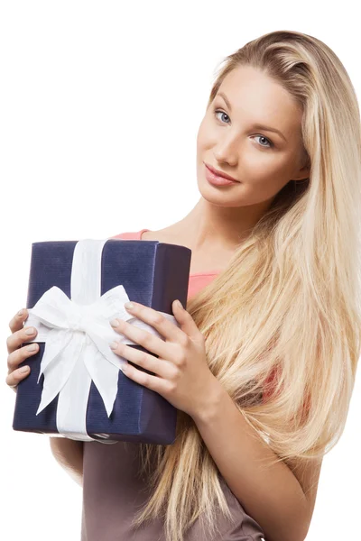 Blonde girl holding gift box — Stock Photo, Image