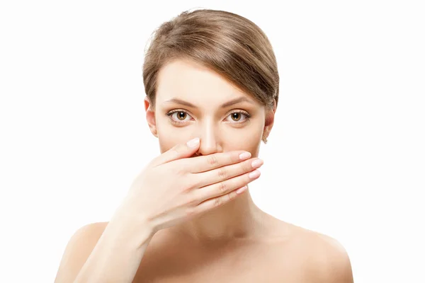 Girl with hand next to her mouth — Stock Photo, Image