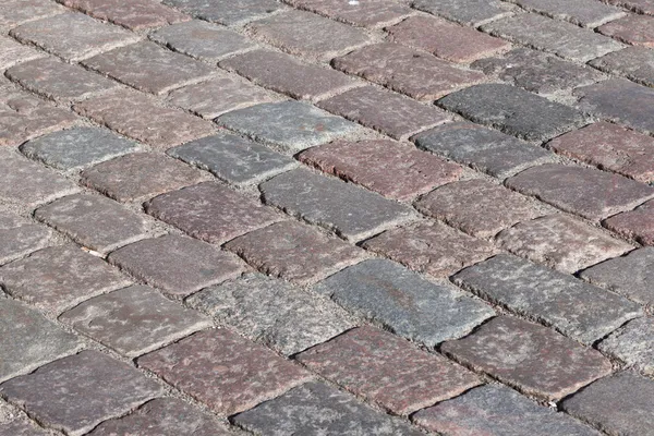 Vieille texture de rue en pierre ou fond — Photo