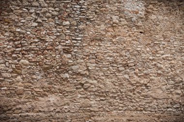 Very old stone wall texture. Dark edged clipart