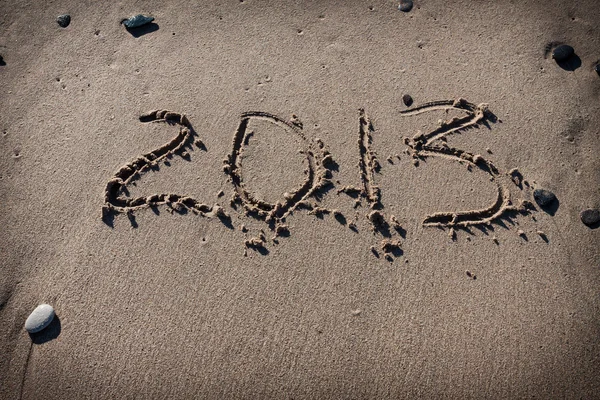 Números 2013 en arena de playa para el calendario — Foto de Stock