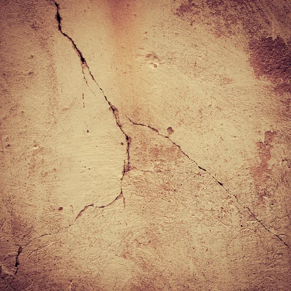 Cracked orange wall wallpaper background — Stock Photo, Image