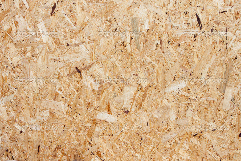Recycled compressed wood chippings board Stock Photo by ©romantsubin