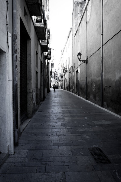 Old catalonia street in Spain (black and white fine art image)