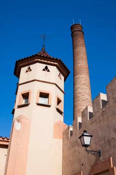 Old tower chimney and lantern on the wall — Stock Photo, Image