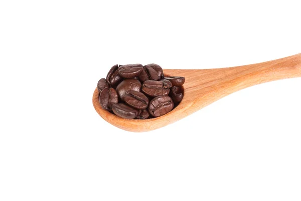 Coffee beans on wooden spoon — Stock Photo, Image