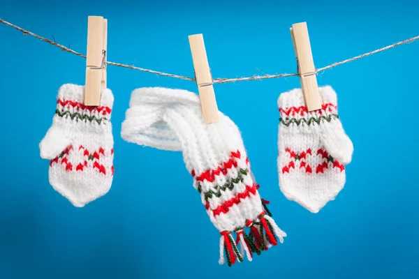 Scarf and pair of gloves drying — Stock Photo, Image
