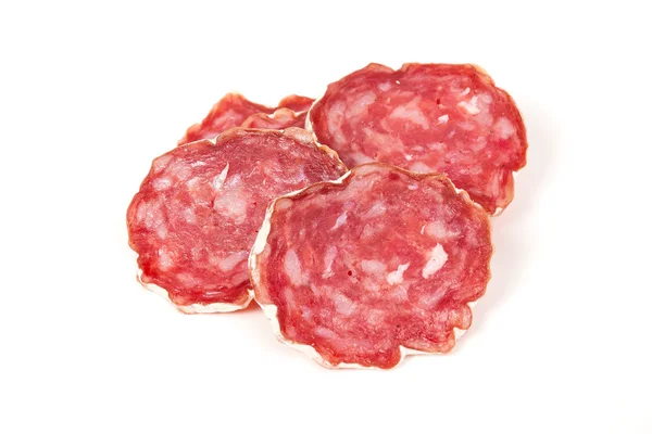 Pila de salami rojo, sobre un blanco — Foto de Stock