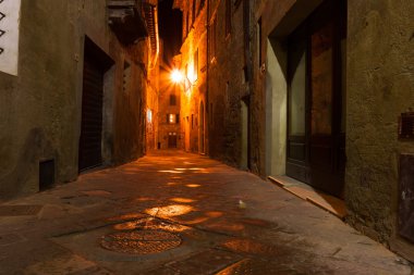 mysterious narrow alley with lanterns clipart